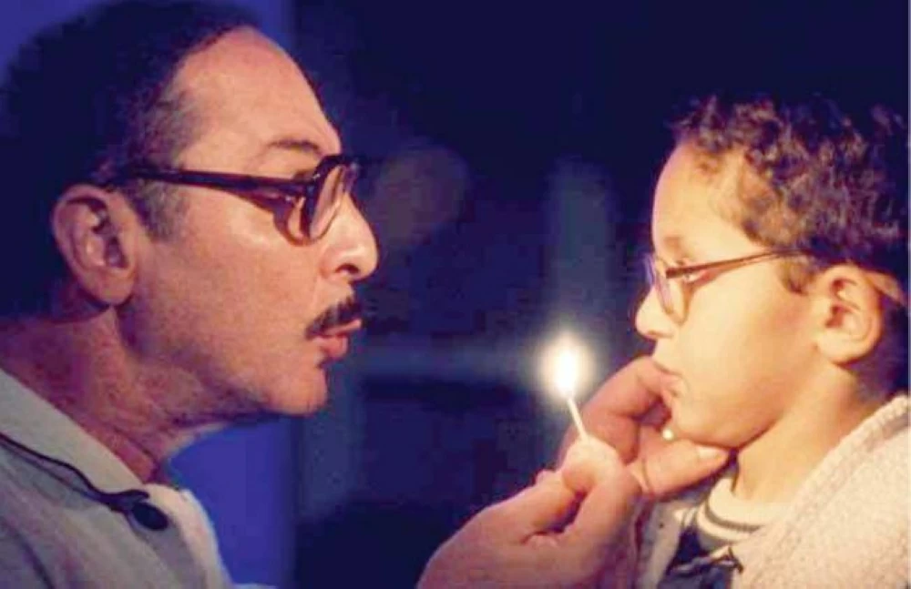 محمود حميدة ويوسف عثمان فى مشهد من بحب السيما&nbsp;