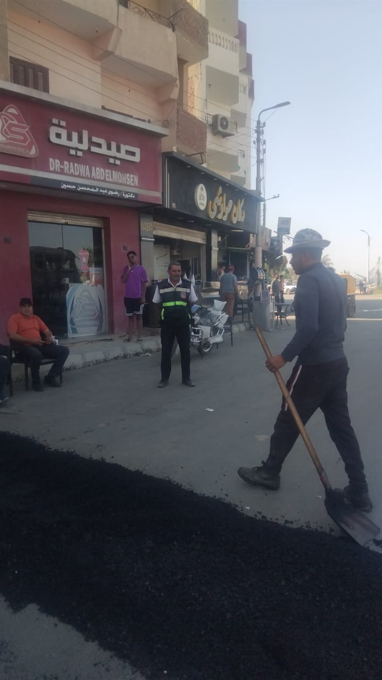 جانب من أعمال تطوير وصيانة الشارع،فيتو