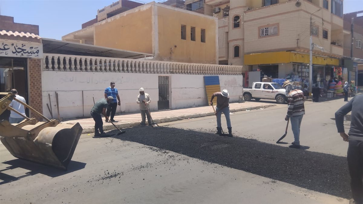 جانب من أعمال تطوير وصيانة الشارع،فيتو