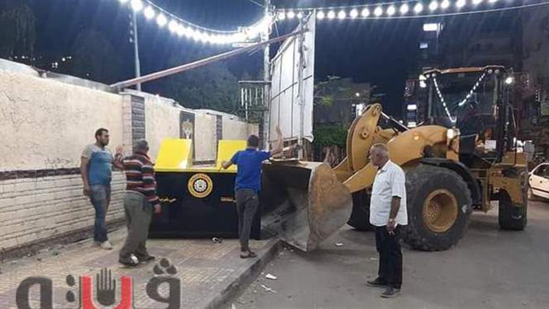 توزيع صناديق قمامة