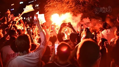 بالأعلام والشماريخ.. احتفالات جماهير الزمالك بشوارع الجيزة | صور