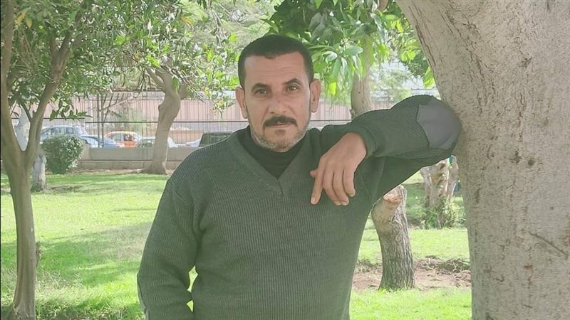 صورة الوالد المطعون