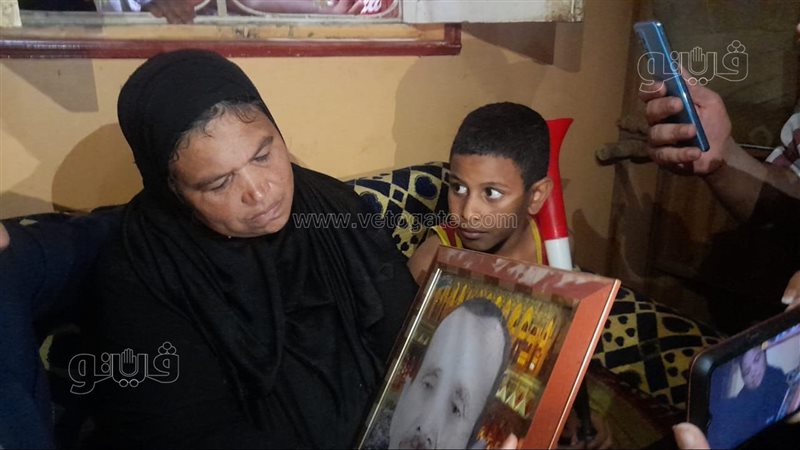 الحاجة رضا مع صورة