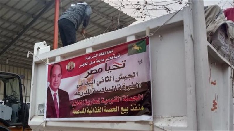 جانب من توزيع الكراتين،فيتو