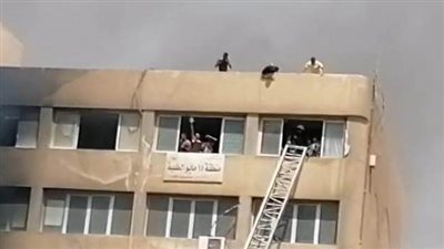 الحماية المدنية تنقذ الموظفين بسلالم هيدروليكية في حريق جهاز 15 مايو (صور)
