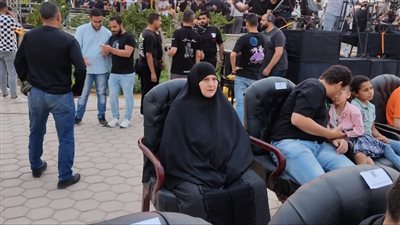 والدة محمد عبد الوهاب تشارك في حفل افتتاح فرع الأهلي بالتجمع الخامس 