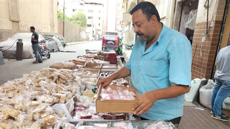 أشرف بائع الحلوى،