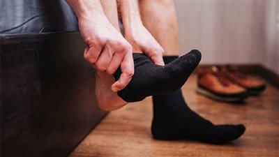 ما حكم المسح على الجورب الأعلى الملبوس بعد نقض الوضوء؟ الإفتاء تجيب