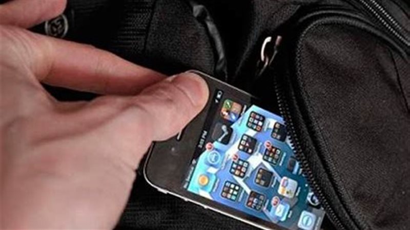 ضبط موظفة منهمة بتصوير