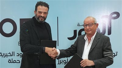 تعاون بين 