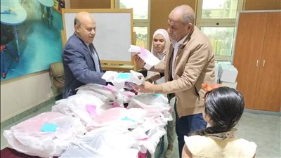 السكرتير العام المساعد لمحافظة الإسماعيلية يشارك الأطفال الأيتام وجمعية التثقيف الفكري إفطارهم(صور) 