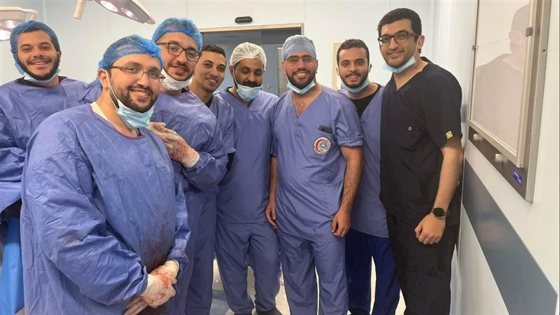 الفريق الذى أجرى