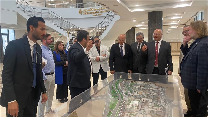  التعاون بين جامعة