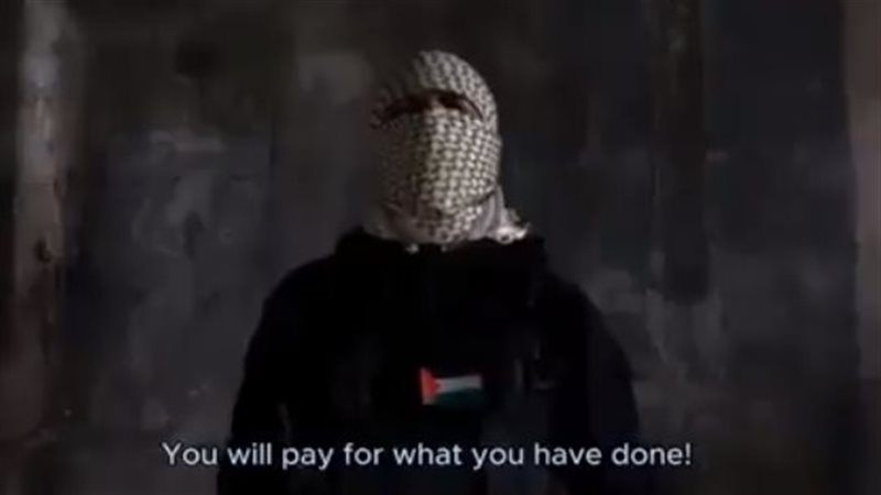 ملثم يتوعد فرنسا