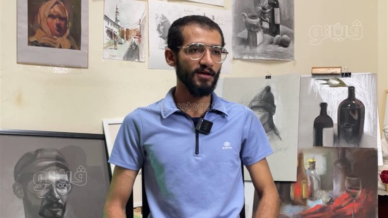إسلام عطية رسام الشارع
