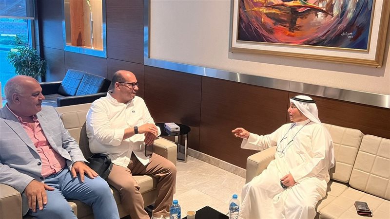 ياسر إدريس مع رئيس