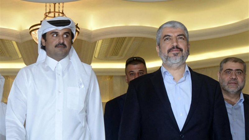 أمير قطر وخالد مشعل،