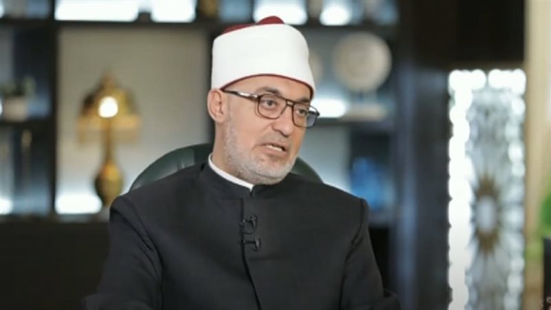 الدكتور نظير عياد،