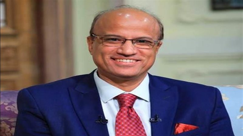 الكاتب الصحفي حسين