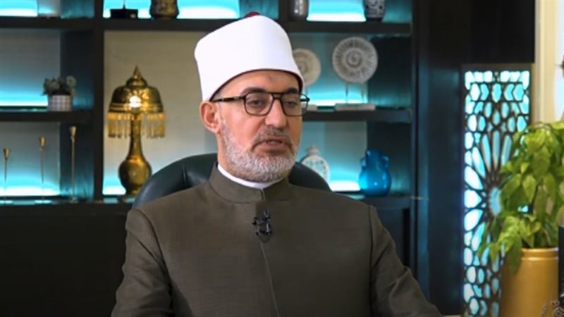 الدكتور نظير عياد،