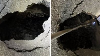 بعد استغاثة المواطنين، إصلاح الهبوط الأرضي المفاجئ بشارع الترعة في المنصورة (صور)