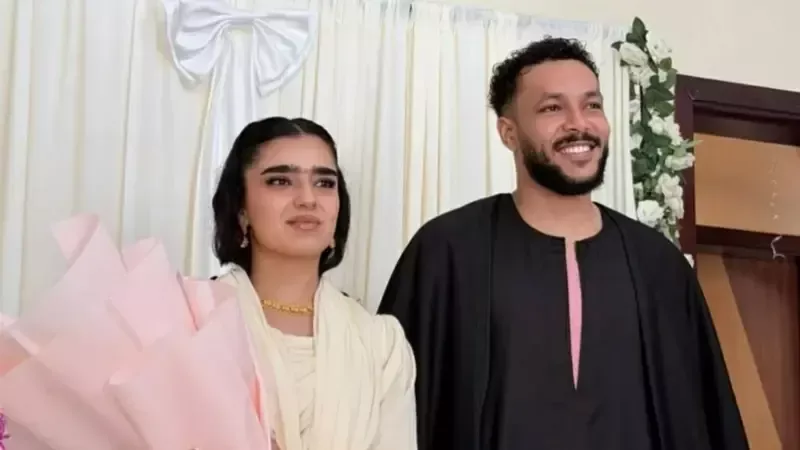 ويجوز وزوجته، فيتو