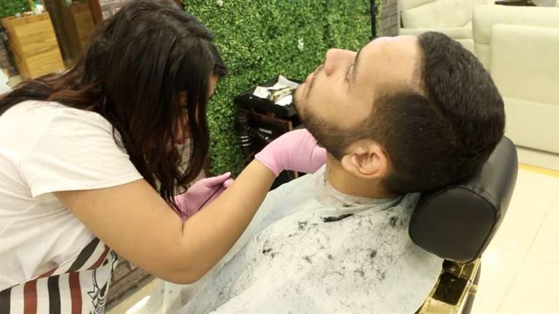حلاقة المرأة للرجل،
