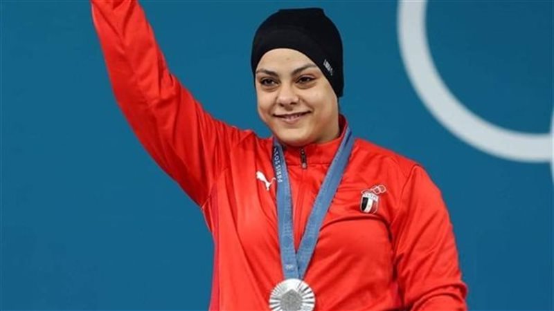 البطلة تحتفل بانجازها،