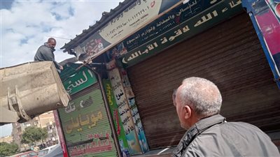 حملة لإزالة الإشغالات والإعلانات المخالفة بشوارع أسيوط 