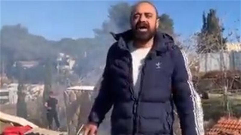 فلسطيني يهدد بحرق