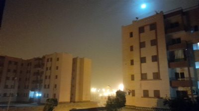 عاصفة ترابية تجتاح محافظة أسوان | صور