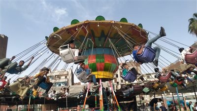  إقبال الأهالي على الحدائق والمتنزهات بأسيوط ثاني أيام العيد