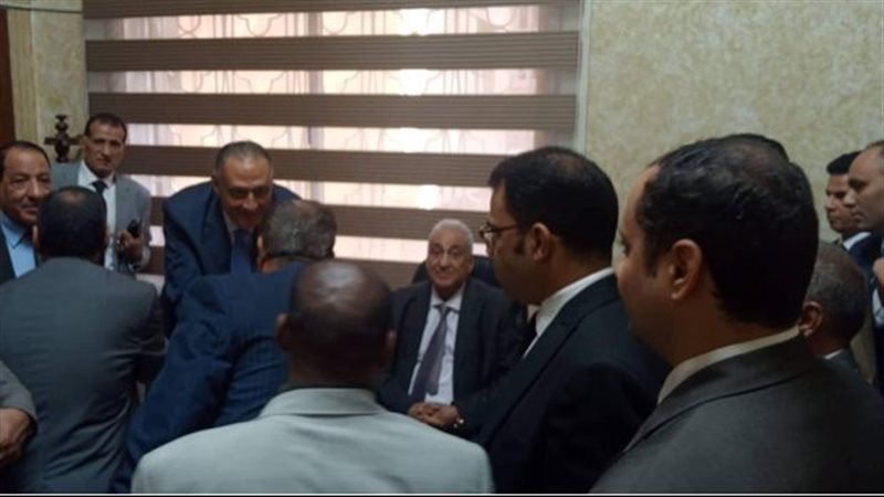سامح عاشور أثناء